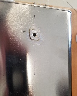 The drilled can before the feedthrough is attached.