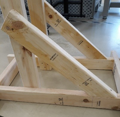 Diagonal braces support the uprights.